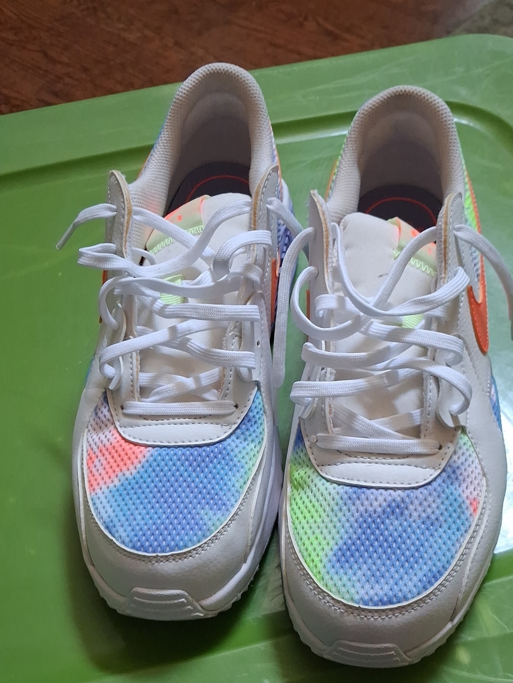 Nike Womens White Athletic Sneakers with Blue, Green and Orange Accents